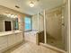 Bathroom featuring a shower, bathtub, vanity and sink at 3650 Deep Cove Dr, Cumming, GA 30041