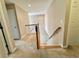 Carpeted staircase with wooden railing at 3650 Deep Cove Dr, Cumming, GA 30041