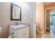Bathroom vanity with granite counters and ample storage space at 554 Cana Of Galilee Ct, Tucker, GA 30084