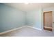 Comfortable bedroom with neutral carpet and light-filled window at 554 Cana Of Galilee Ct, Tucker, GA 30084