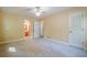 Spacious bedroom with neutral walls, carpet and ceiling fan at 554 Cana Of Galilee Ct, Tucker, GA 30084