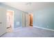 Bedroom with ensuite bathroom access and closet at 554 Cana Of Galilee Ct, Tucker, GA 30084