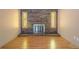 Living room with a brick fireplace at 554 Cana Of Galilee Ct, Tucker, GA 30084