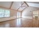 View of living room with vaulted ceiling, windows and french doors at 554 Cana Of Galilee Ct, Tucker, GA 30084