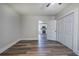 Bedroom with hardwood floors and closet, with view of the kitchen at 899 Marshall Fuller Rd, Dallas, GA 30157