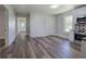 Spacious kitchen area with stainless appliances and new floors at 899 Marshall Fuller Rd, Dallas, GA 30157