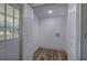 Bright laundry room features wood-look floors, utility hookups, and easy access to the outside at 899 Marshall Fuller Rd, Dallas, GA 30157