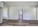 Open floor plan with new floors, shiplap walls, and new trim at 899 Marshall Fuller Rd, Dallas, GA 30157