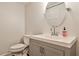 Bathroom features modern vanity, fixtures, and oval mirror at 2302 Colonial Ne Dr, Brookhaven, GA 30319
