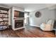 Inviting living room with fireplace, modern flooring and lots of natural light at 2302 Colonial Ne Dr, Brookhaven, GA 30319
