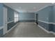 Open-concept living area with tiled floors, offering versatility for various layouts and design at 4175 Danforth Sw Rd, Atlanta, GA 30331