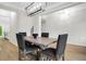 Dining room with natural light, stylish seating, and modern light fixture at 4240 Spring Ridge Dr, Cumming, GA 30028