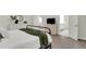 Comfortable bedroom with carpet and white furniture at 4240 Spring Ridge Dr, Cumming, GA 30028