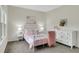 Comfortable bedroom with floral decor at 4240 Spring Ridge Dr, Cumming, GA 30028