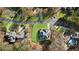 Aerial view of estate home on large lot with mature trees in an established neighborhood at 4370 Freys Farm Nw Ln, Kennesaw, GA 30152
