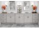 Dual sinks and gray cabinets in this stylish bathroom at 4370 Freys Farm Nw Ln, Kennesaw, GA 30152