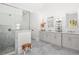 Bathroom featuring a glass-enclosed shower, dual sinks and gray cabinets at 4370 Freys Farm Nw Ln, Kennesaw, GA 30152