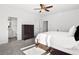 Bright main bedroom featuring closet and entry to the main bathroom at 4370 Freys Farm Nw Ln, Kennesaw, GA 30152