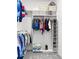 Walk-in closet showing built-in shelving and hanging racks for optimal storage and organization at 4370 Freys Farm Nw Ln, Kennesaw, GA 30152