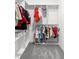 Walk-in closet with custom shelving and ample storage for clothing at 4370 Freys Farm Nw Ln, Kennesaw, GA 30152
