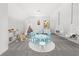 Bright room with hanging chairs, a table with chairs, and a tent at 4370 Freys Farm Nw Ln, Kennesaw, GA 30152