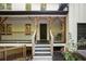 Inviting front porch with wood beams, steps, and a charming entrance to the home at 4614 Riveredge Cv, Snellville, GA 30039