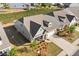 An aerial view showcases this house's roofline, landscaping, and proximity to neighborhood amenities at 503 Forest Ln, Canton, GA 30114