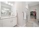 Elegant bathroom features granite countertops, white cabinets, walk-in shower, and a spacious walk-in closet at 503 Forest Ln, Canton, GA 30114