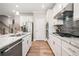 Spacious kitchen featuring an island, stainless steel appliances, and modern finishes at 503 Forest Ln, Canton, GA 30114