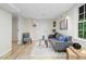 Finished basement provides a cozy living area with stylish furnishings and natural light at 6659 Manoleta Dr, Lithonia, GA 30038