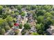 Desirable home is nestled among trees and other beautiful homes in a well-maintained neighborhood at 1555 Heritage Trl, Roswell, GA 30075