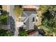 Home featuring a patio and yard in a well-maintained neighborhood surrounded by lush trees at 1555 Heritage Trl, Roswell, GA 30075