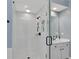 The bathroom features a frameless shower with white subway tile and black fixtures at 1555 Heritage Trl, Roswell, GA 30075