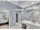 Bathroom with a walk-in closet, water closet, and a make-up vanity at 1555 Heritage Trl, Roswell, GA 30075