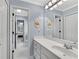Well-lit bathroom with double vanity and a mirror, creating a functional and stylish space for daily routines at 1555 Heritage Trl, Roswell, GA 30075