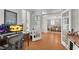Spacious home office with hardwood floors and french doors leading to other rooms at 1555 Heritage Trl, Roswell, GA 30075