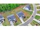Aerial view of new homes with well-maintained lawns in a suburban neighborhood at 3180 Andover St, Cumming, GA 30028