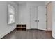 Bedroom boasting hardwood floors, closet with double doors, and bright natural light at 3180 Andover St, Cumming, GA 30028