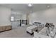 Large upstairs loft with comfortable seating, media center, and lots of natural light at 3180 Andover St, Cumming, GA 30028