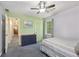 Cozy bedroom with green accent wall, carpet, and window with natural light at 3876 Winners Ct, Marietta, GA 30062