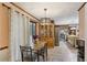 Eat-in kitchen with a wooden table and chairs, complemented by modern appliances and decor at 3876 Winners Ct, Marietta, GA 30062