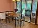 Dining area with table, chairs, and access to the patio and backyard at 3876 Winners Ct, Marietta, GA 30062