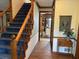 Inviting foyer features wood floors, staircase, and decorative accents at 3876 Winners Ct, Marietta, GA 30062