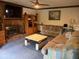 Comfortable living room with fireplace, sofas, and built-in bookshelves at 3876 Winners Ct, Marietta, GA 30062