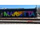 A colorful, creative Marietta mural is displayed at 3876 Winners Ct, Marietta, GA 30062