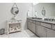 Bright bathroom featuring double sinks with granite countertops and modern fixtures and decor at , Atlanta, GA 30316