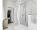 This bathroom features white marble floors, walk in shower, and access to the walk-in closet at , Atlanta, GA 30316
