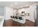 Island kitchen with modern chairs and stainless steel appliances at , Atlanta, GA 30316