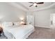 This spacious bedroom features a tray ceiling, ceiling fan, and ensuite bathroom access at , Atlanta, GA 30316