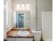 Bathroom featuring a white vanity, mirror, and a toilet with shower/tub combo at 270 Hunt Ridge Dr, Stockbridge, GA 30281